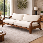 Modern Sculptural Sofa with Curved Wood Frame and Plush Cushions